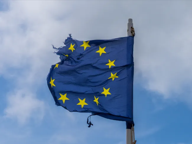A tattered European Union flag